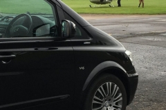 Viano next to helicopter