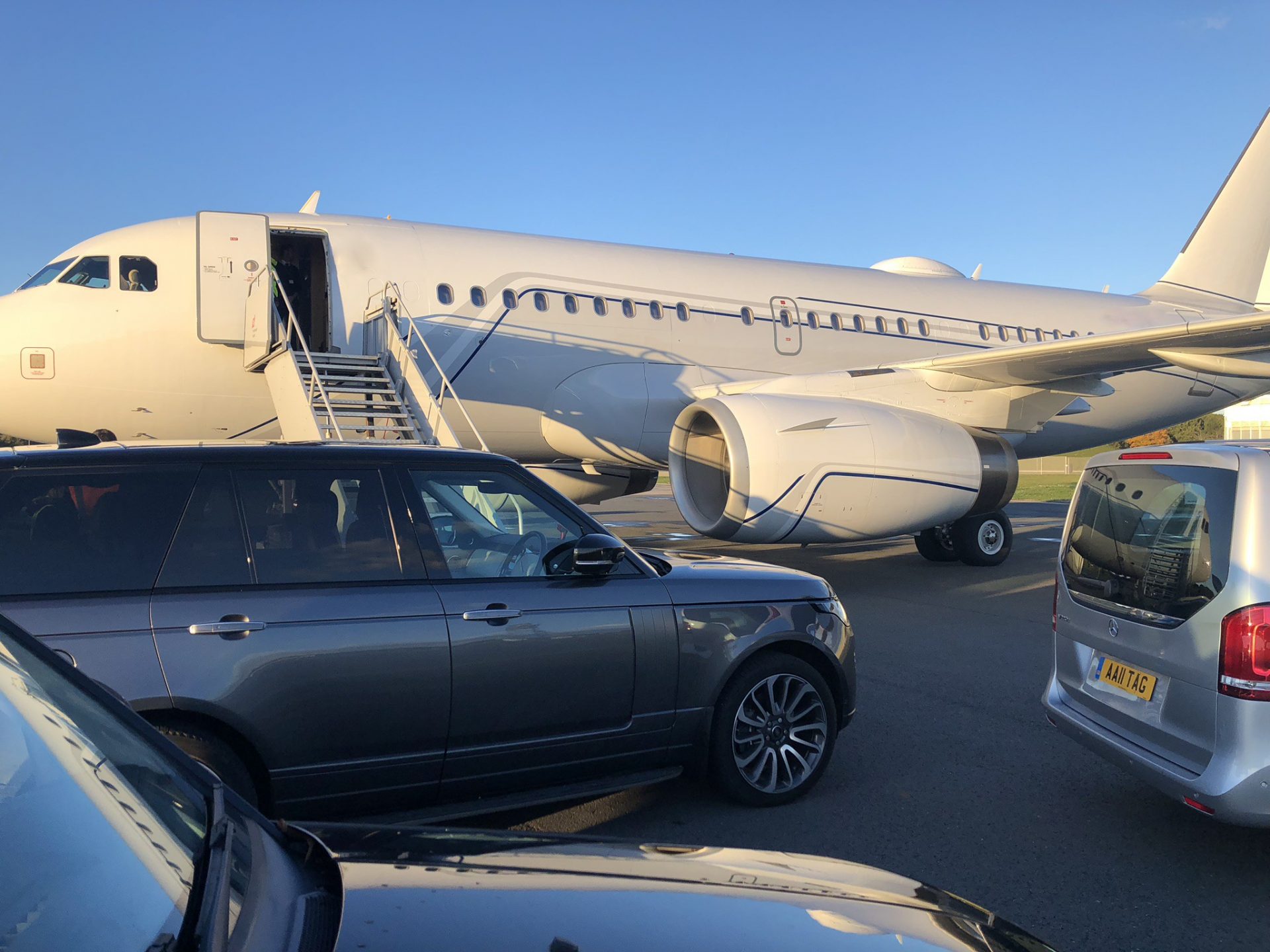 Range Rovers at the steps on tarmac at TAG